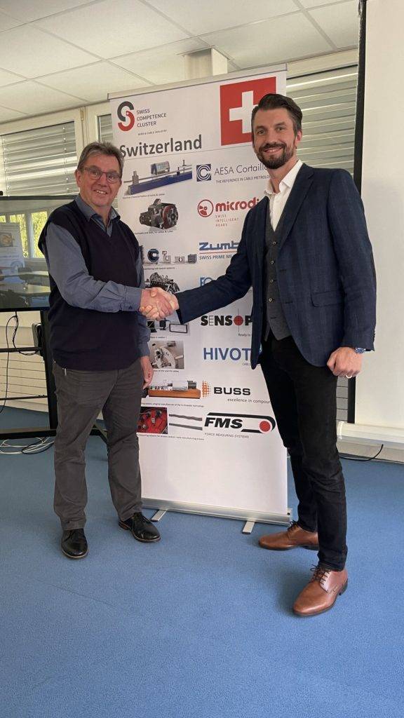 SCC President Jean-Luc Allemann welcomes the new member HAEFELY represented by Fréderique Dollinger